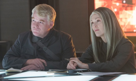 Philip Seymour Hoffman and Julianne Moore portrays in The Hunger Games: Mockingjay - Part 1.