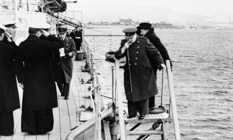 Commanding presence: Churchill leaving HMS Ajax to attend a conference ashore. Athens can be seen in the background.