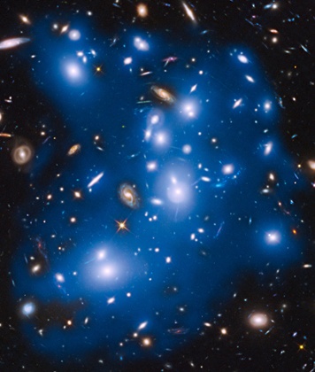 Hubble Space Telescope has picked up the faint, ghostly glow of stars ejected from ancient galaxies that were gravitationally ripped apart several billion years ago. The mayhem happened 4 billion light-years away, inside an immense collection of nearly 500 galaxies nicknamed 'Pandora's Cluster', also known as Abell 2744.