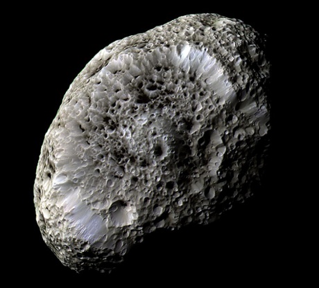 Cassini obtained this false-color view of Saturn's chaotically tumbling moon Hyperion during a flyby on Sept. 26, 2005. The spacecraft detected a strong electrostatic charge on the moon's surface, a first for any body other than Earth's moon.