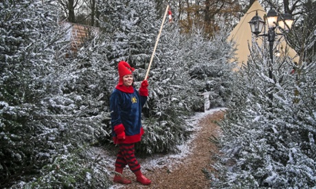 An elf leads the way during the frosty winter forest at the Sutton Coldfield event.