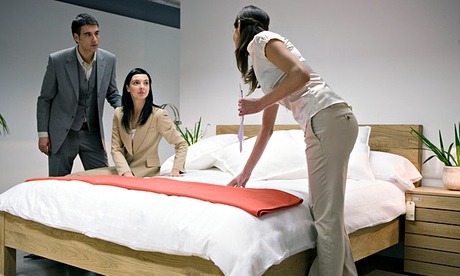 Couple choosing a new bed