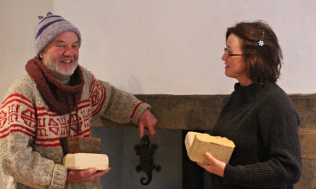 man and woman by fire