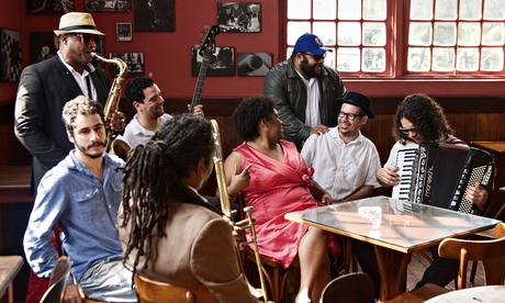 DJ Dolores (second from right) and band