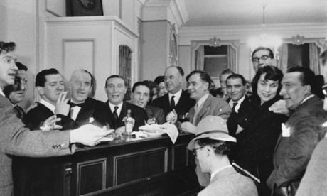Frankie Fraser (fifth from left) among career criminals and journalists at a party in Soho.