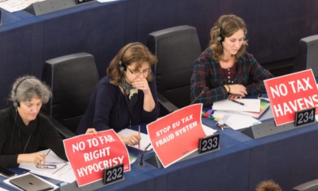 Members of far-left parties protest in the European parliament against the tax system in Luxembourg.