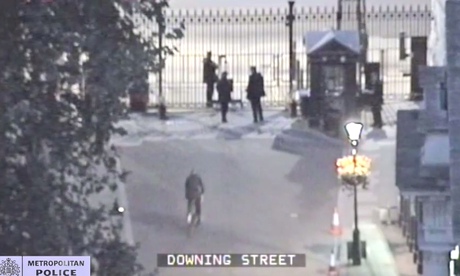 CCTV shows Andrew Mitchell (bottom left) approaching officers at the gates of Downing Street