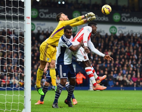 Ben Foster punches clear for West Brom.