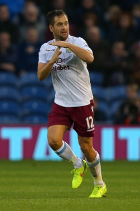 Joe Cole takes time out from celebrating scoring the opener to order his half-time beverage
