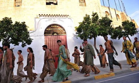Some of Game of Thrones' 550 extras leaving Osuna's bullring. Photograph: Cristina Quicler/AFP/Getty