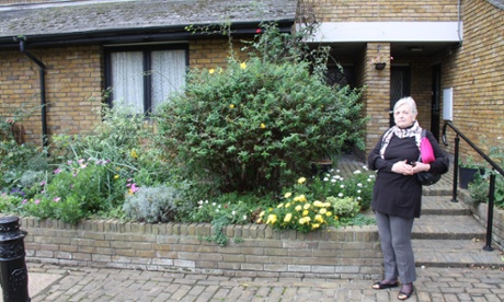Annie Redmile outside her home in Chesterton Square