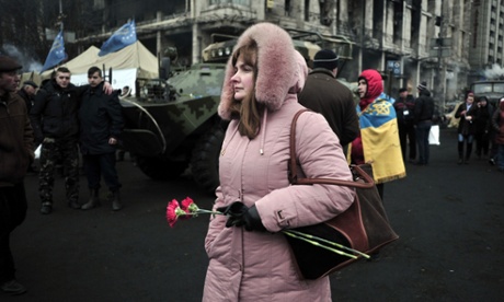 A woman walks through Maidan Square in Kiev, Ukraine.