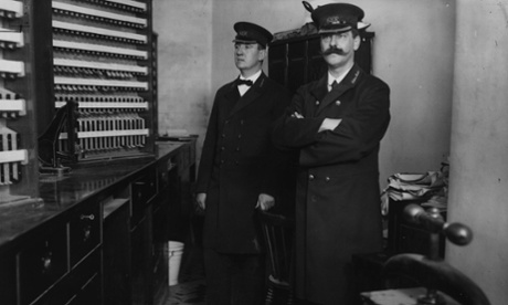 1912 ... two employees in the ticket office at Liverpool Street.