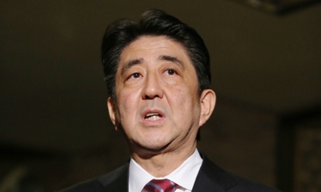 PM Shinzo Abe briefs reporters on his talks with a Japanese envoy who visited North Korea.