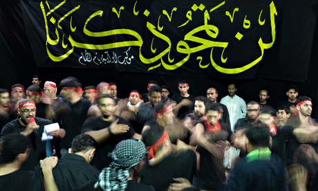 Saudi Shia men mark Ashura, which commemorates the killing of Imam Hussein