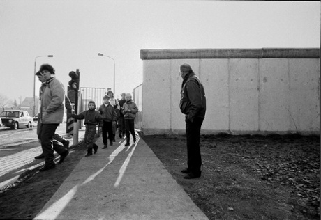 This photo was taken at Rudow, Berlin. The man waiting by the border was pacing up and down and chain-smoking. I asked him if he was waiting for someone and he replied: ‘Yes, my daughter.’ I asked how long since he had seen her. He stopped, turned to face me and said: ‘Twenty-six years.’ When I left, he was still waiting
