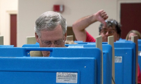 Mitch McConnell is given the thumbs down by a voter.