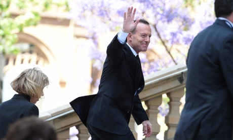 Tony Abbott arrives to jeers from the crowd outside Sydney town hall for the memorial service for Gough Whitlam.