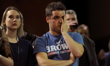 Supporters of Republican US Senate candidate Scott Brown watch with dismay as returns come in at Brown's midterm election night rally.