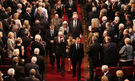 Tony Abbott leaves the state memorial service. He received no more than a few polite claps on arrival.
