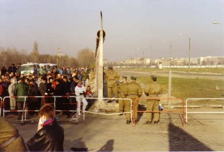 Opening the Wall at Potsdamer Platz. This photo was taken a day or so after the Wall was opened. I squeezed past the crowds to capture this shot down the middle