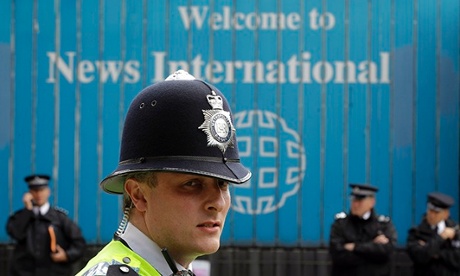 Police on duty outside News International