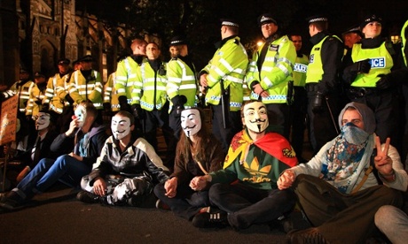 anonymous protestors in parliament square in 2013