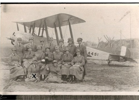 annie ulrickson in front of an avro plane at the flight of the school of special flying in gosport