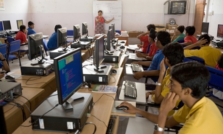 Students in a computer studies class at school in Hazira, India