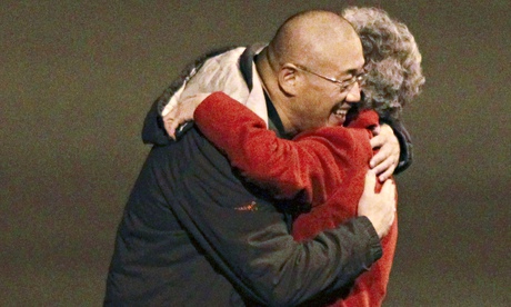 Kenneth Bae is greeted by his mother upon landing at Joint Base Lewis-McChord