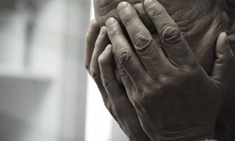 Depression man head in hands