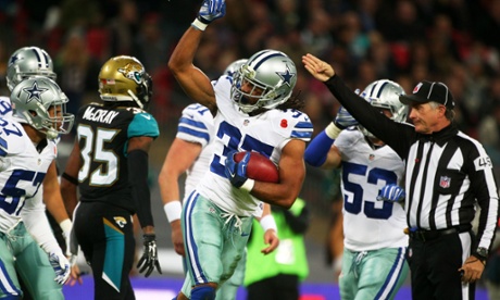C.J. Spillman of the Dallas Cowboys celebrates after making a fumble recovery after Ace Sanders of the Jackson Jaguars fumbled the punt. Three plays later Dallas took the lead on a Tony Romo TD pas to Jason Witten.