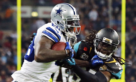 Dallas Cowboys' Dez Bryant breaks away from Jacksonville Jaguars' Johnathan Cyprien at Wembley