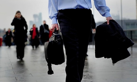 City workers walking, a man in front a woman behind