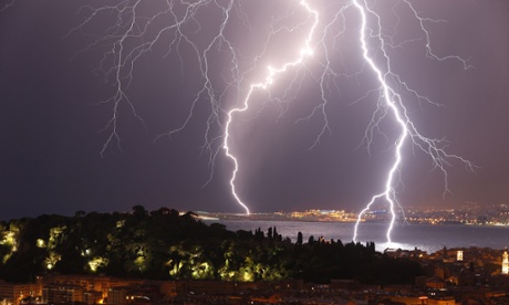 Flashes of lightning strike above the 