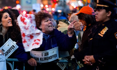 Protesters engage people thought to be ticket holders as they protest about the staging of John Adams's Death of Klinghoffer at the Metropolitan Opera, New  York.