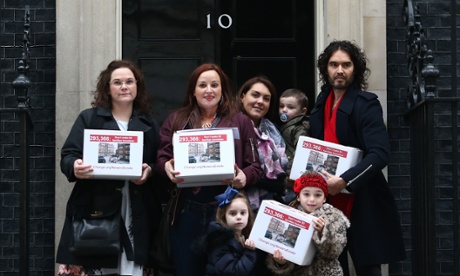 Comedian Russell Brand joins residents and supporters from the New Era housing estate as they deliver a petition to 10 Downing Street.