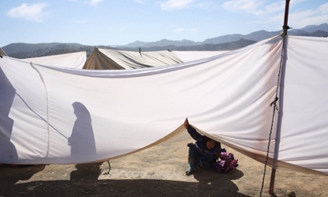A sheet dividing boys from girls at the Norwegian Refugee Council school in Gulan refugee camp.
