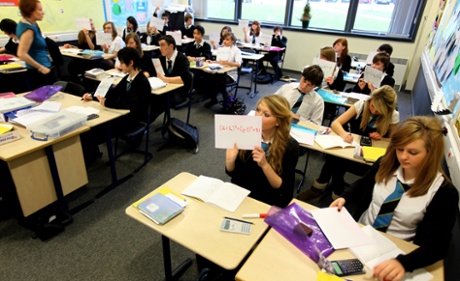 Pupils at Williamwood High School attend a maths class in Glasgow, Scotland