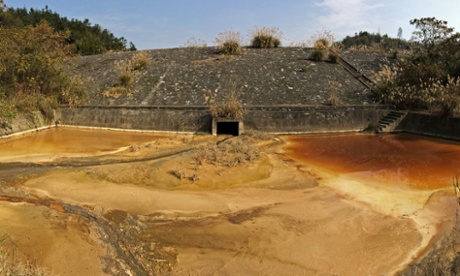 View of aluminum-polluted water, which flows into the Yuanjiang River, in Taoyuan county, Changde city, central China's Hunan province, 19 November 2014.  Authorities at the central and local levels began investigating a pollution case in which an aluminum manufacturer  Chuangyuan Aluminum Co Ltd  is believed to have caused environmental damage in Central China.
