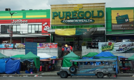A jeepney outside a less-affluent mall in Manila,  Philippines.