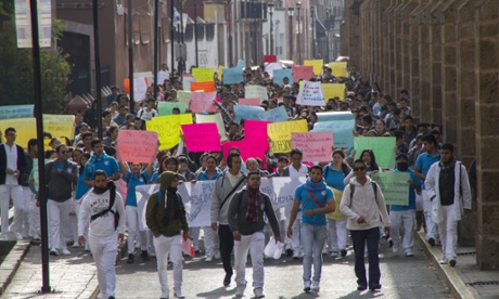 Nurses in the Mexican city of Morelia march against the disappearance and subsequent murder of one of their colleagues.