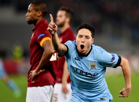 Manchester City's French midfielder Samir Nasri celebrates after scoring.