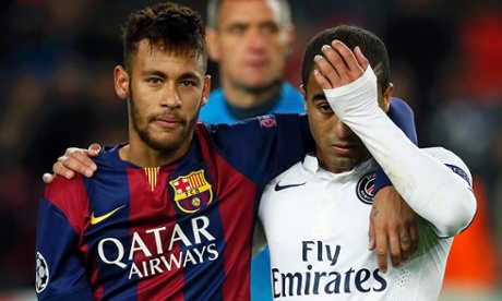 Lucas, right, is consoled by Barcelona's Neymar after Paris Saint-Germain's 3-1 defeat.