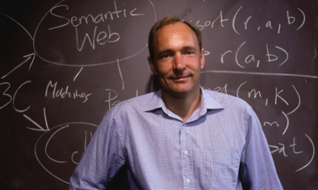 Tim Berners-Lee, inventor of the World Wide Web, stands at a chalkboard where he has written notes on Web development.