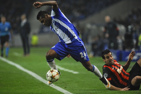 Fancy footwork part II - Porto's Alex Sandro leaves Shakhtar Donetsk's Ilsinho on his backside during their 1-1 draw.