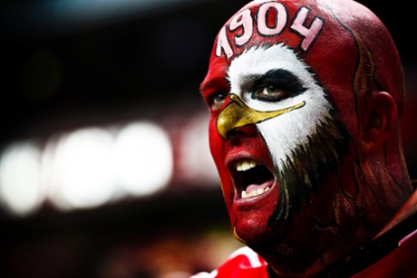 The birdman of Benfica cheers for his team ahead of their 0-0 draw against Bayer Leverkusen.
