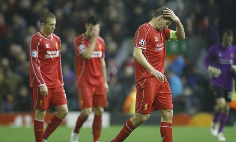 Steven Gerrard leaves the pitch after Liverpool are eliminated from the Champions League.