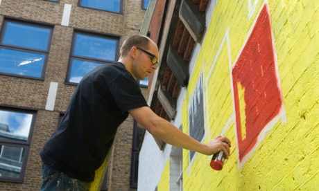 Ben Eine at work in central London.