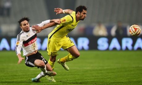 Nacer Chadli hands off Kerim Frei Koyunlu.